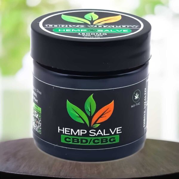 Hemp Salve - 1 OZ - Thrive Vitality - 1 Thrive Vitality Hemp Salve 1500mg jar, natural plant-based formula for skin nourishment and everyday pain support, in black container with green and orange leaf logo.